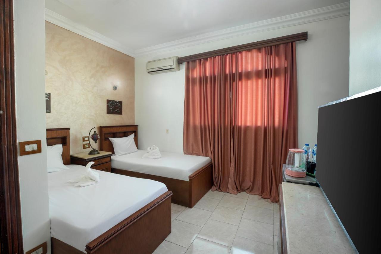 Pyramids Inn Hotel Kafrat al Jabal Exterior foto